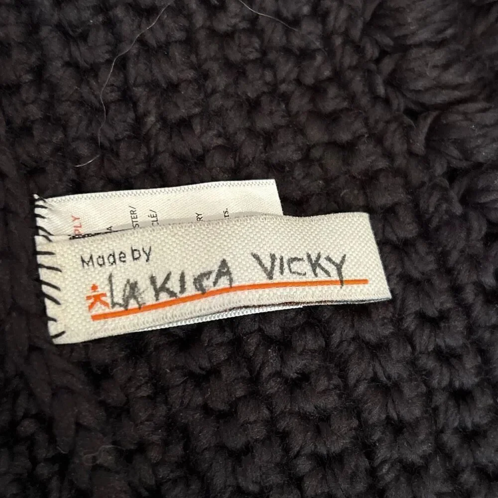 Known Supply hand knit Large black infinity wrap made a Uganda. Women business s